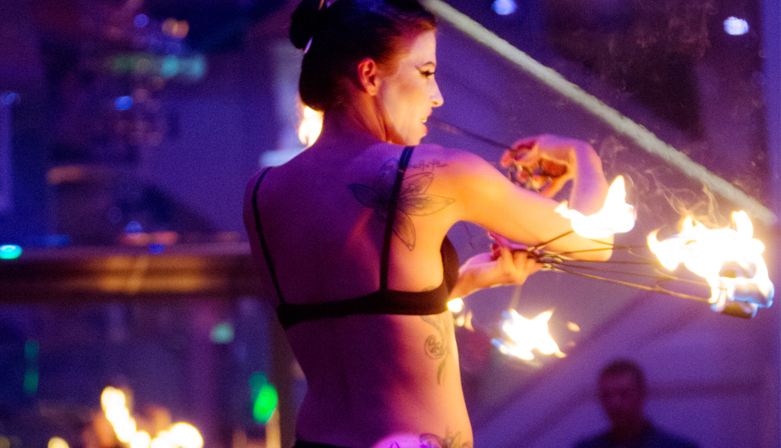 Baton Rouge Strip Clubs, Dancer With Fire Image - The Penthouse Club