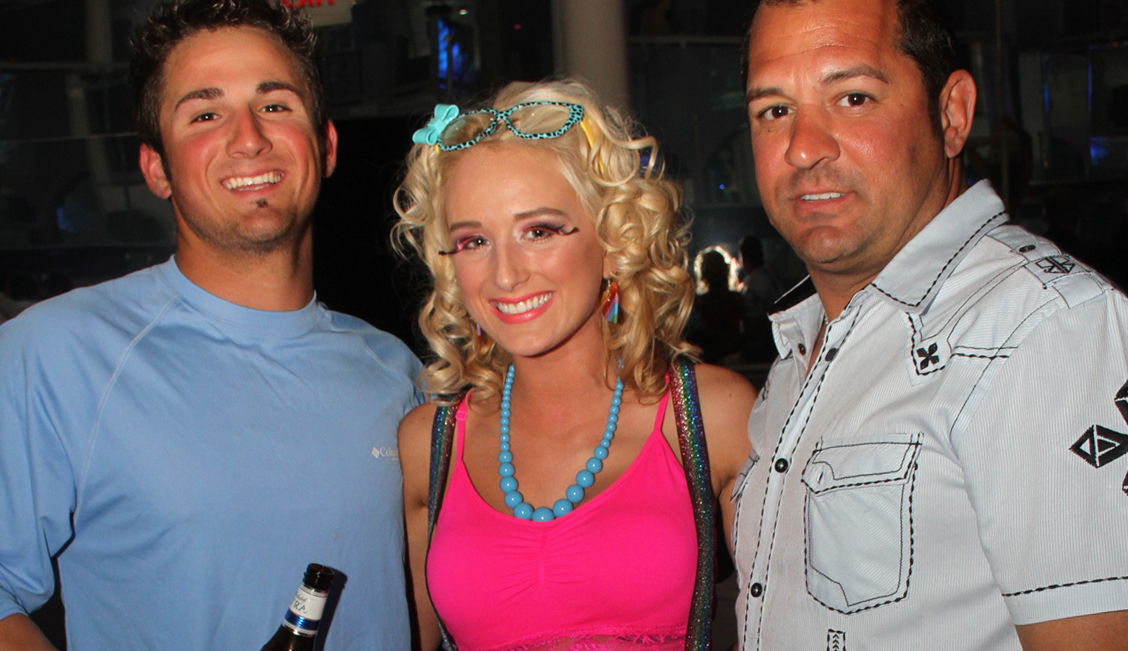 Pink party in a Baton Rouge strip club with two happy men image - The Penthouse Club